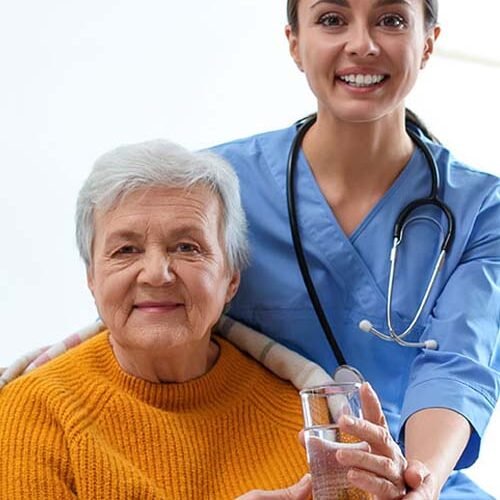 female nurse holding tablet computer