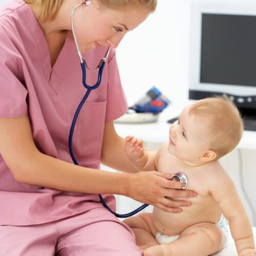 Pediatrician with baby